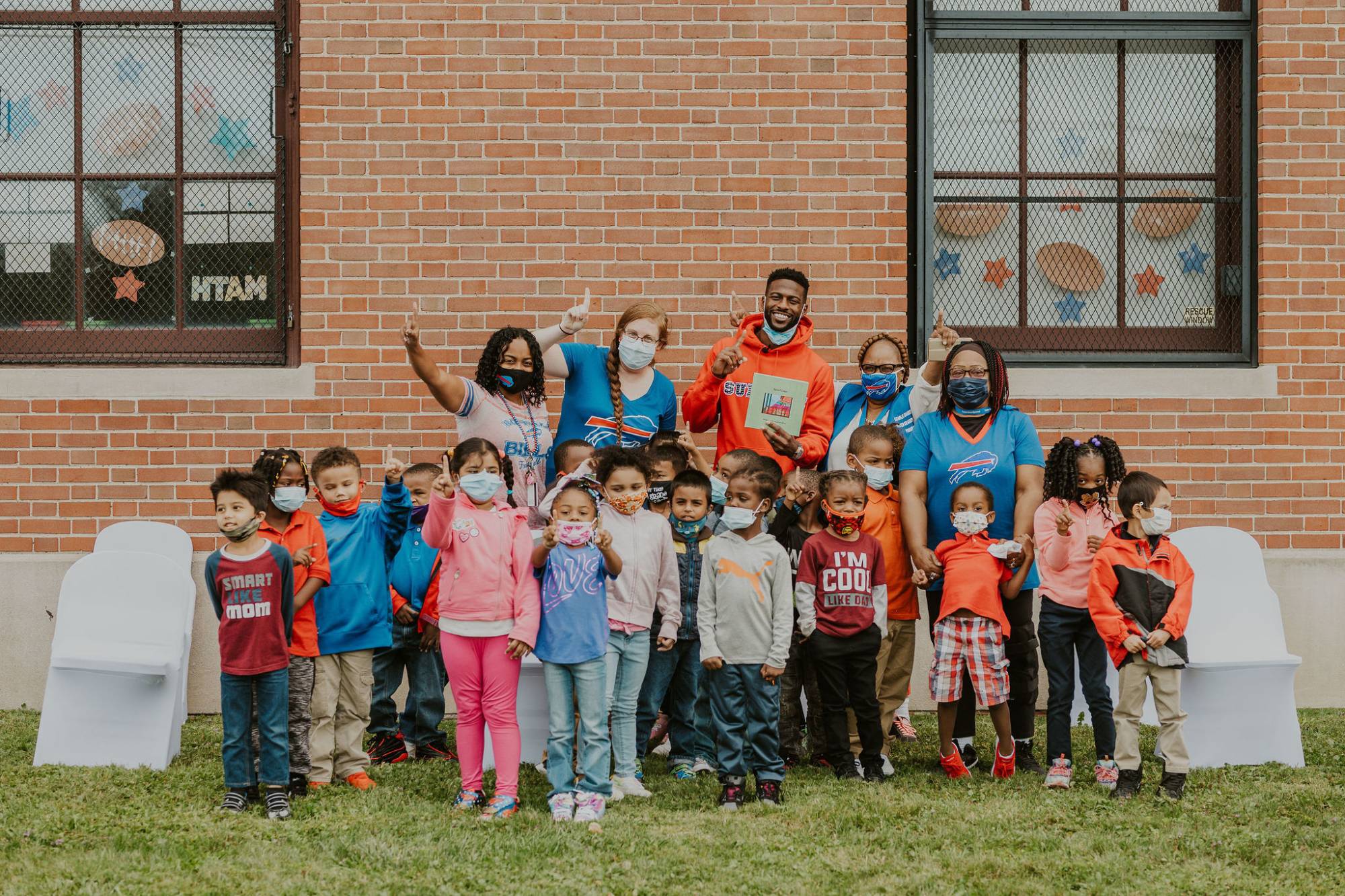 Emmanuel Sanders with kids and teachers in Buffalo